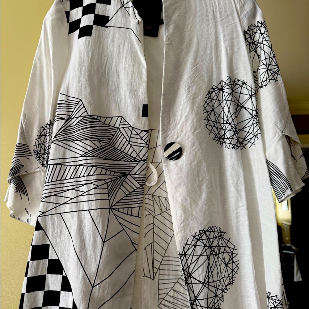 A great looking coverup with 1 button